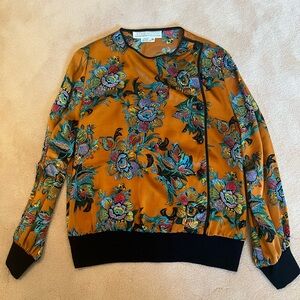Starington Women's Floral Blouse - Orange with floral design and black trim